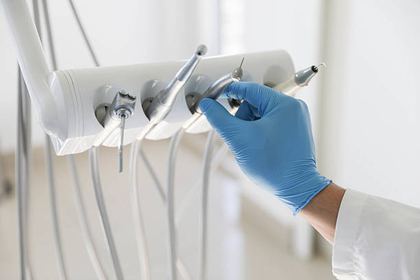 Professional Tooth Extraction technician working in Freeland, MI